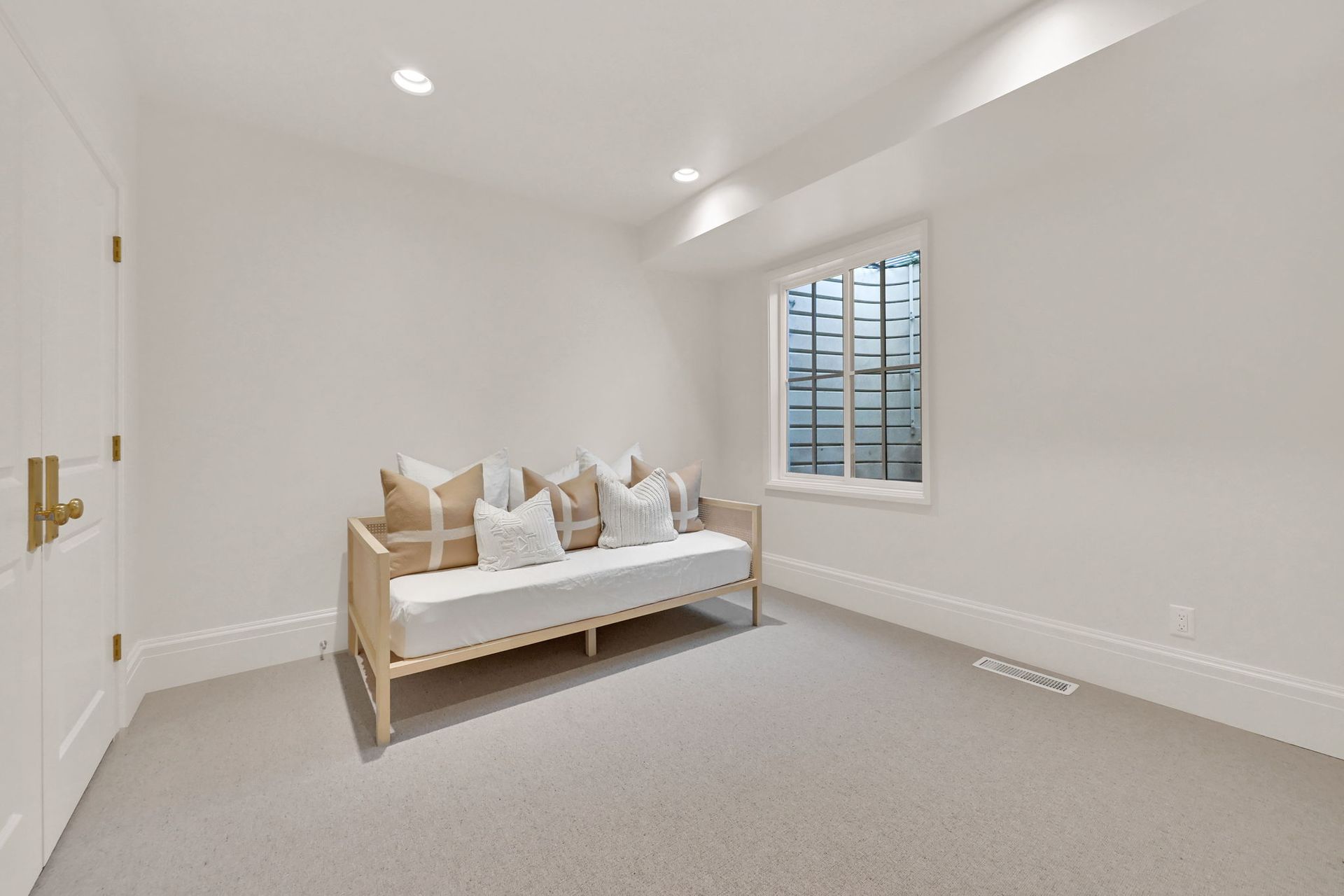 There is a couch in the middle of the room.