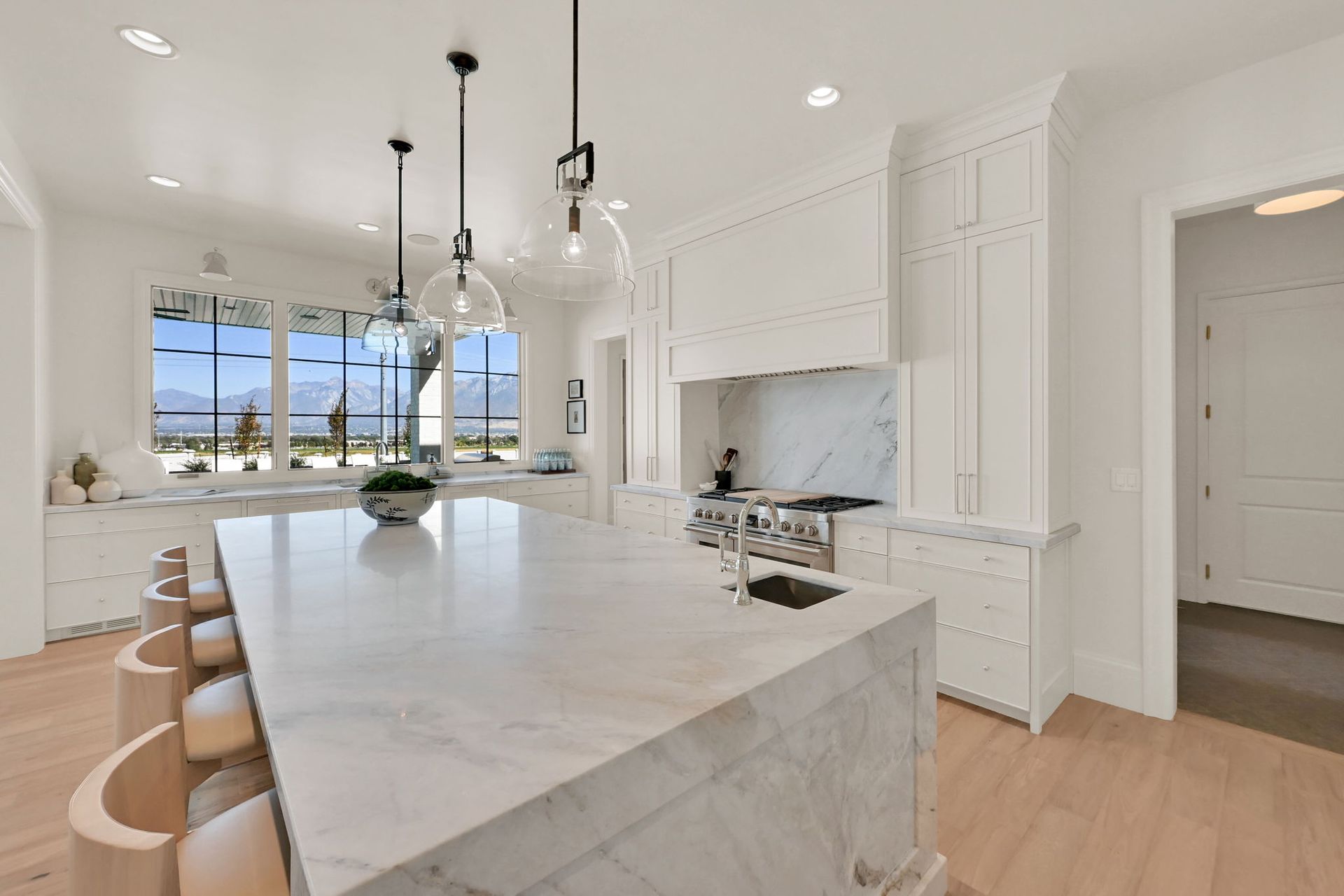There is a large island in the middle of the kitchen.
