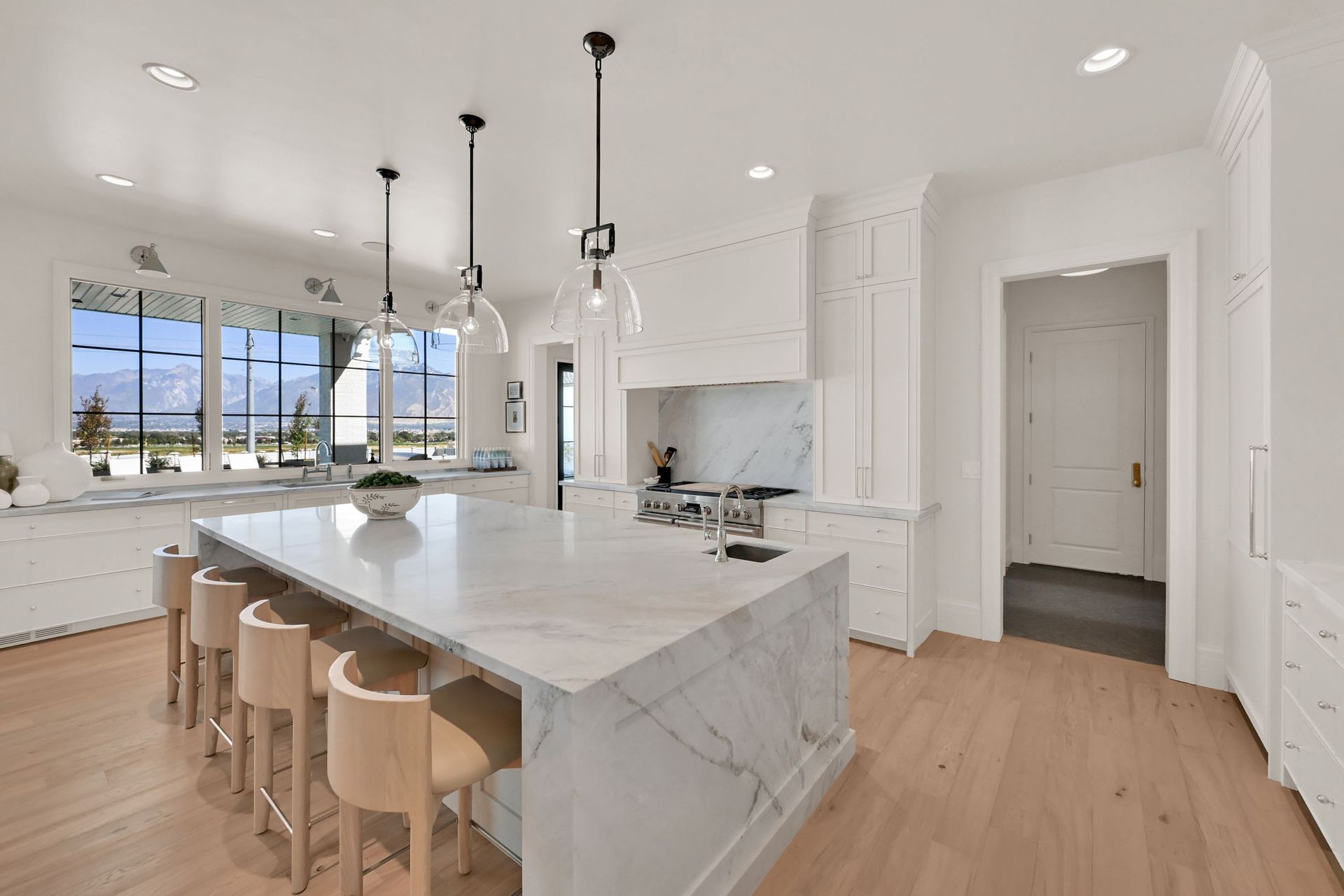 There is a large island in the middle of the kitchen.