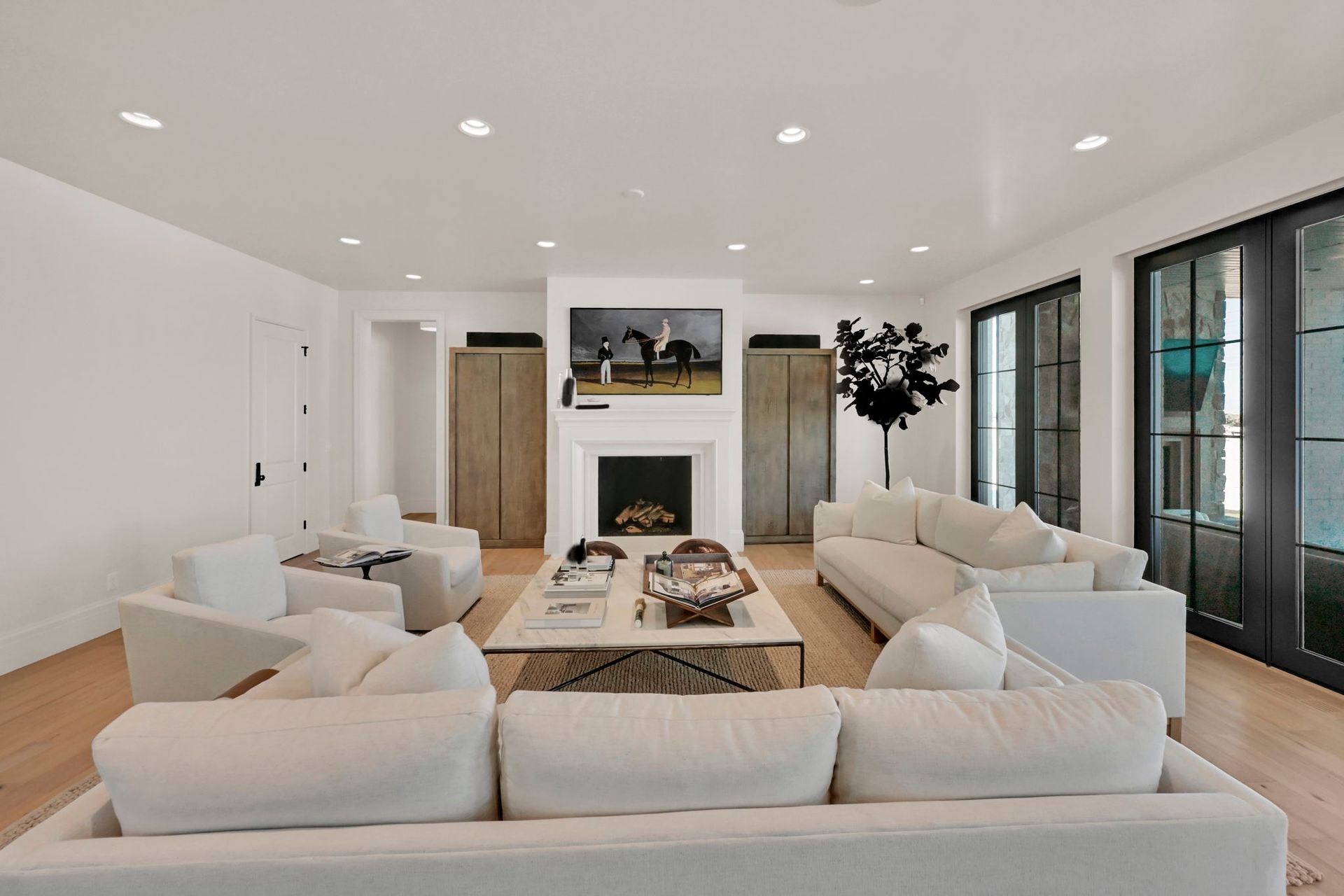 A living room filled with furniture and a fireplace.