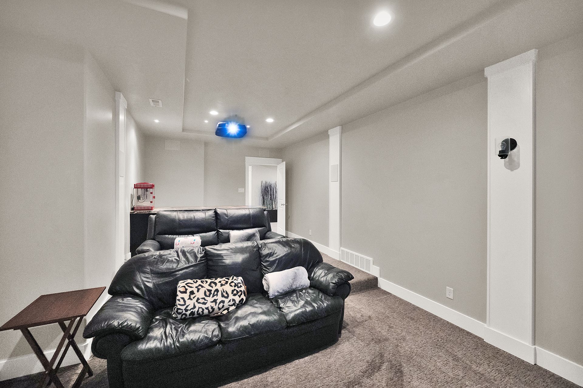 There is a couch in the middle of the room.