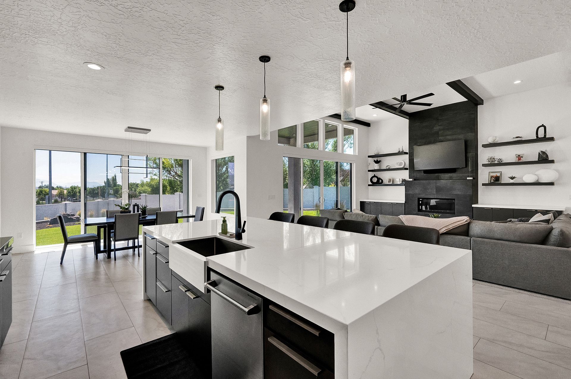 A kitchen with a large island and a sink