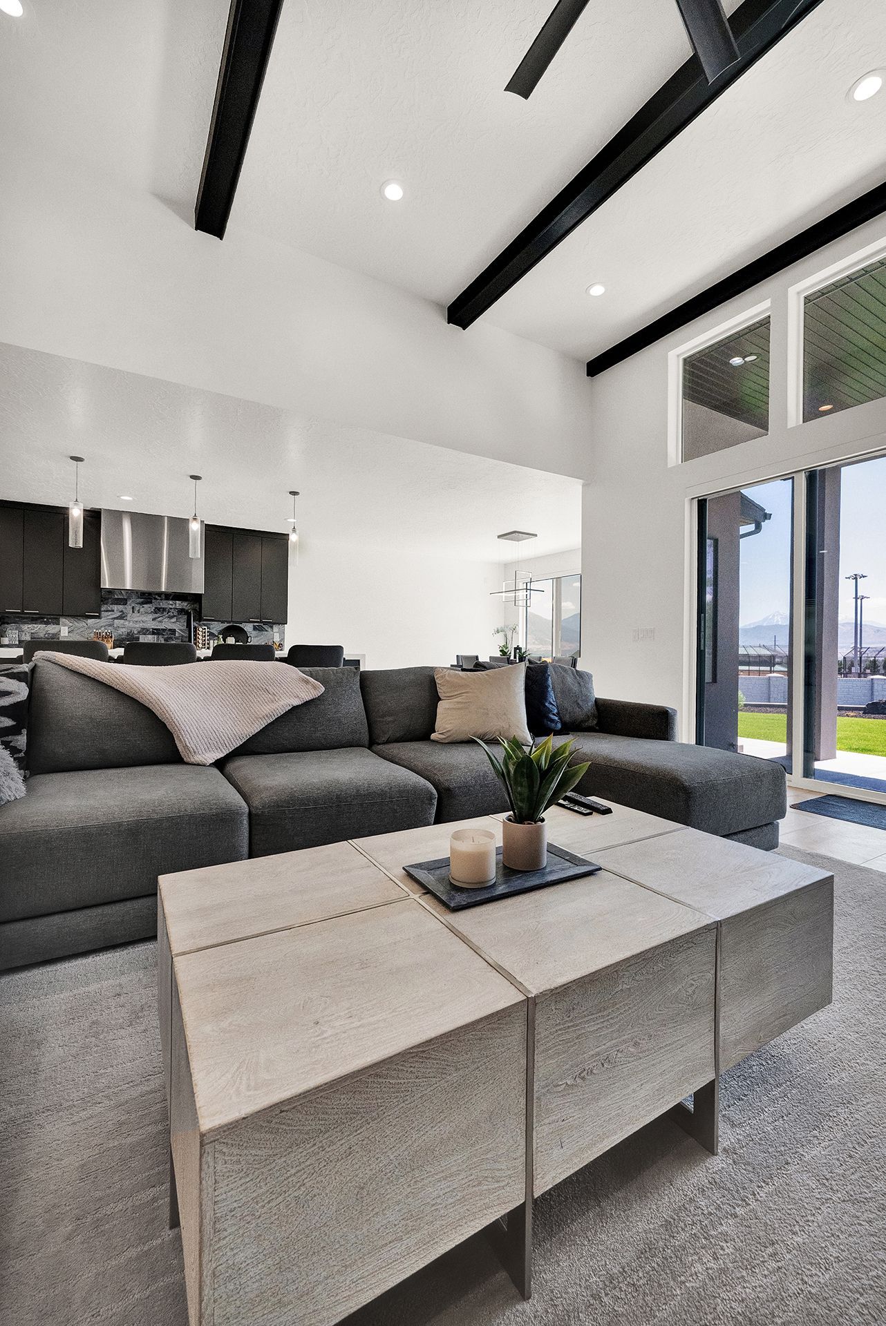 A living room with a couch and a coffee table