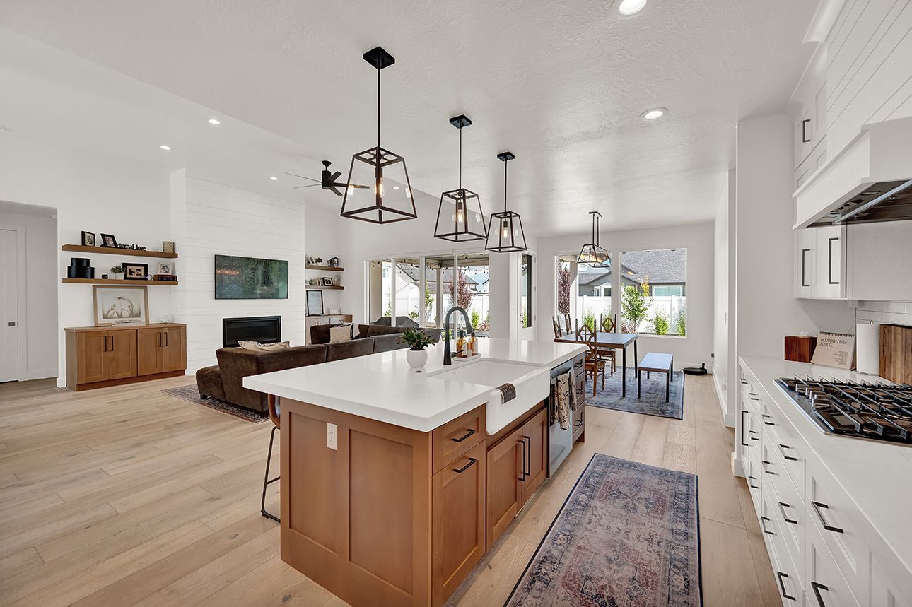 A kitchen with a large island in the middle of the room.
