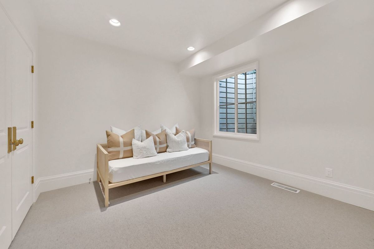 There is a couch in the middle of the room.