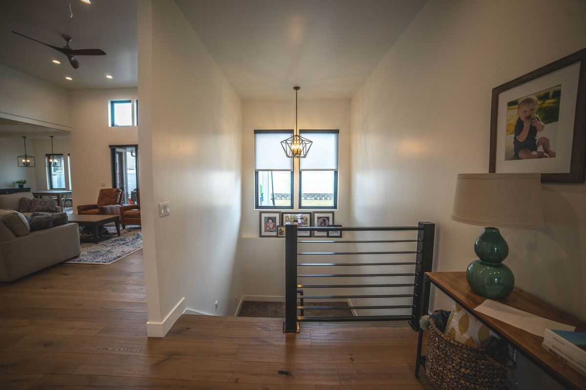 There is a staircase leading up to the second floor of a house.