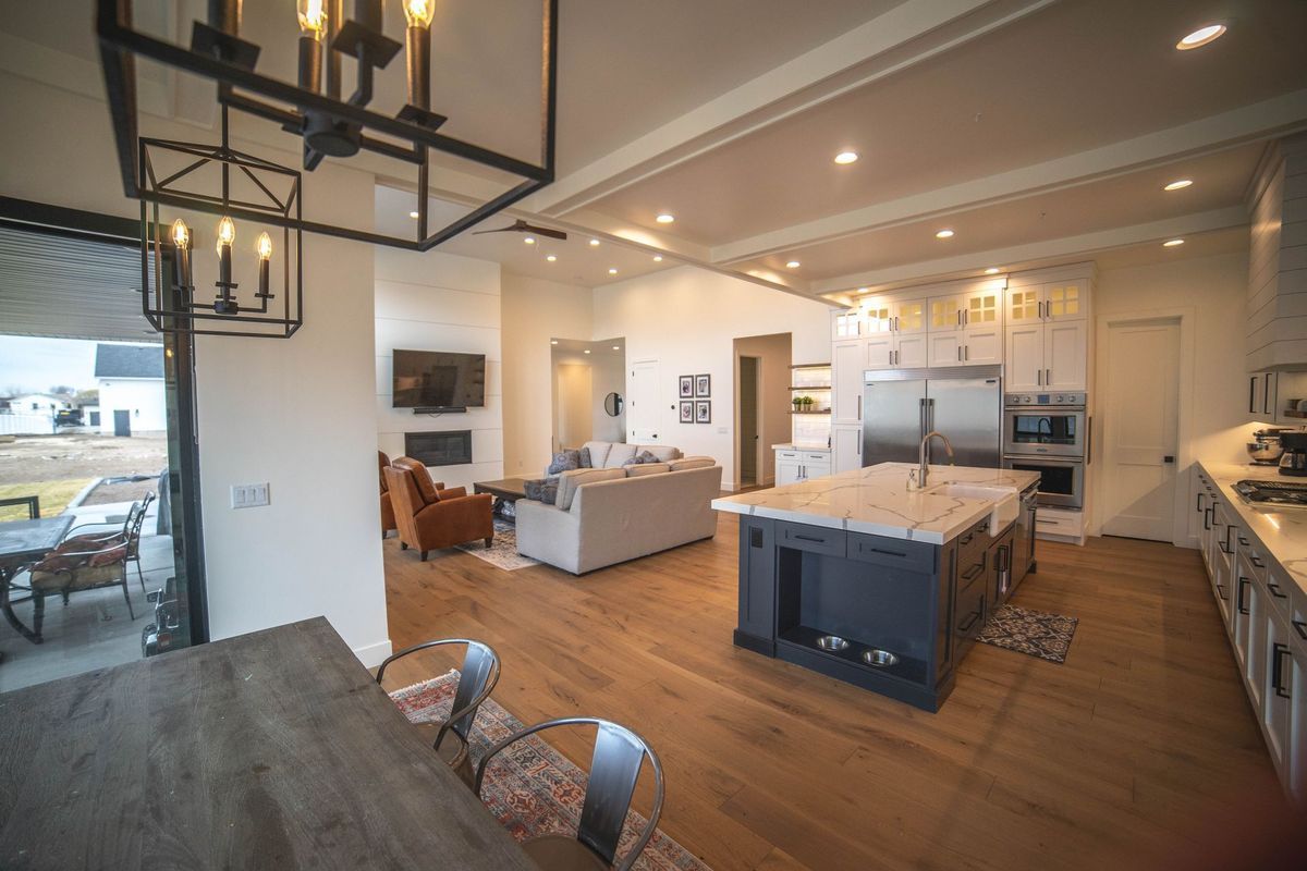 There is a large island in the middle of the kitchen.