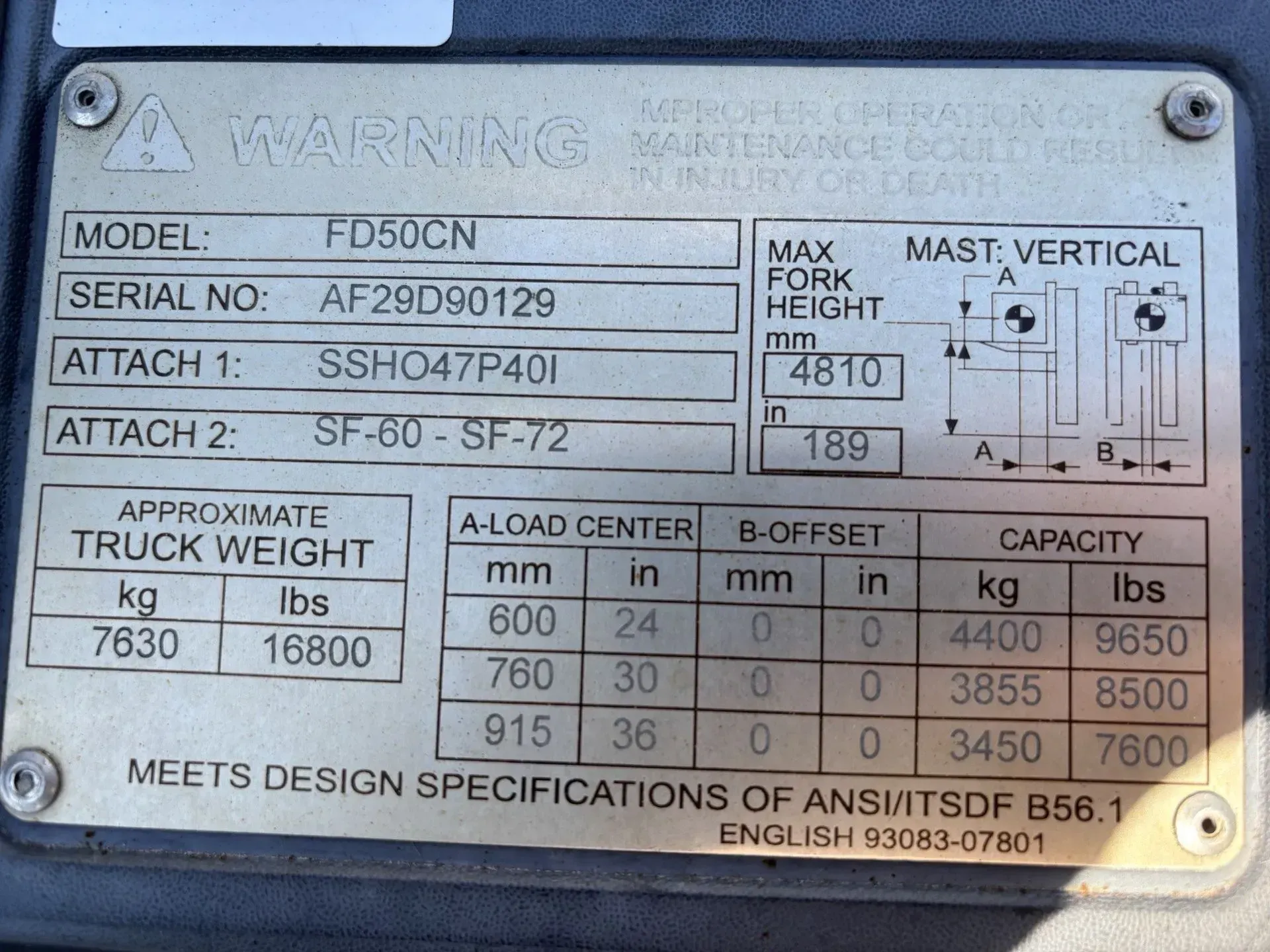 Forklift data plate with model, serial number, attachments, truck weight, capacity, and dimensions.