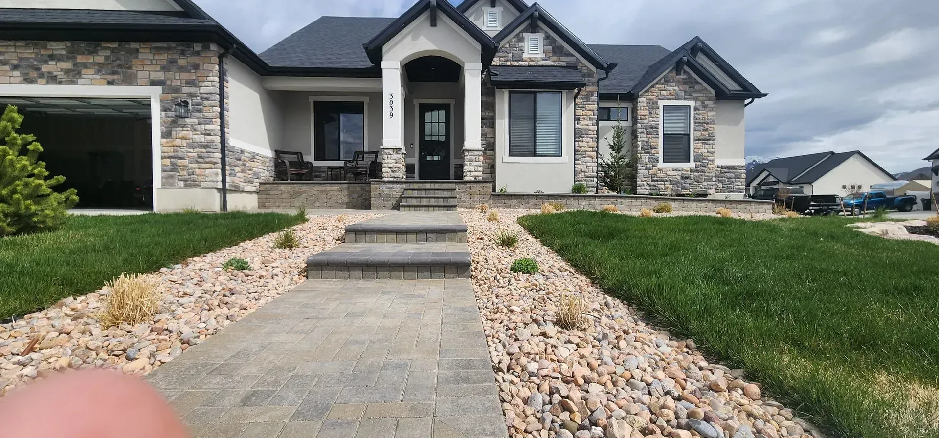 A small swimming pool in the backyard of a house