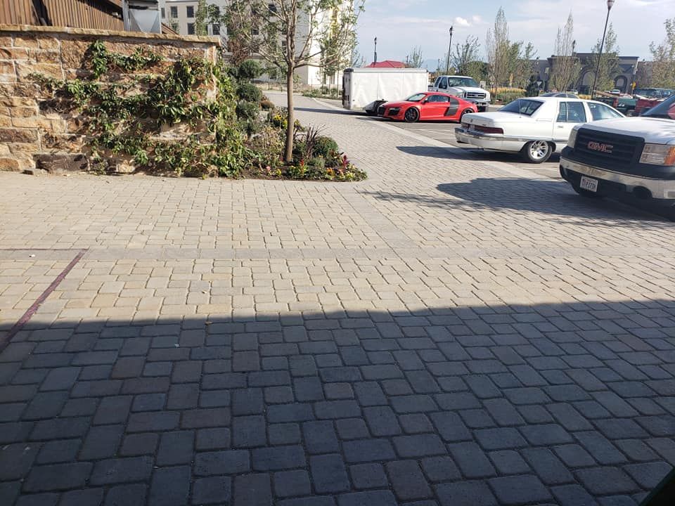 A gmc truck is parked in a parking lot