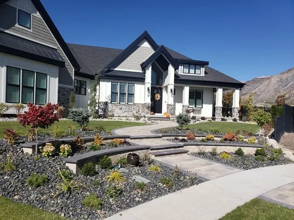 A large house with a walkway leading to it