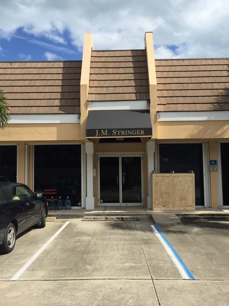 J.M Stringer Entry Door With Awning