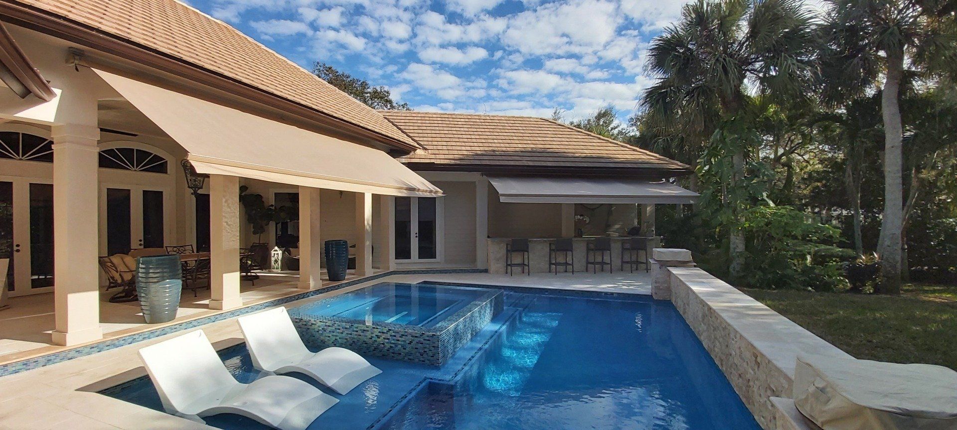 pool with beige awnings