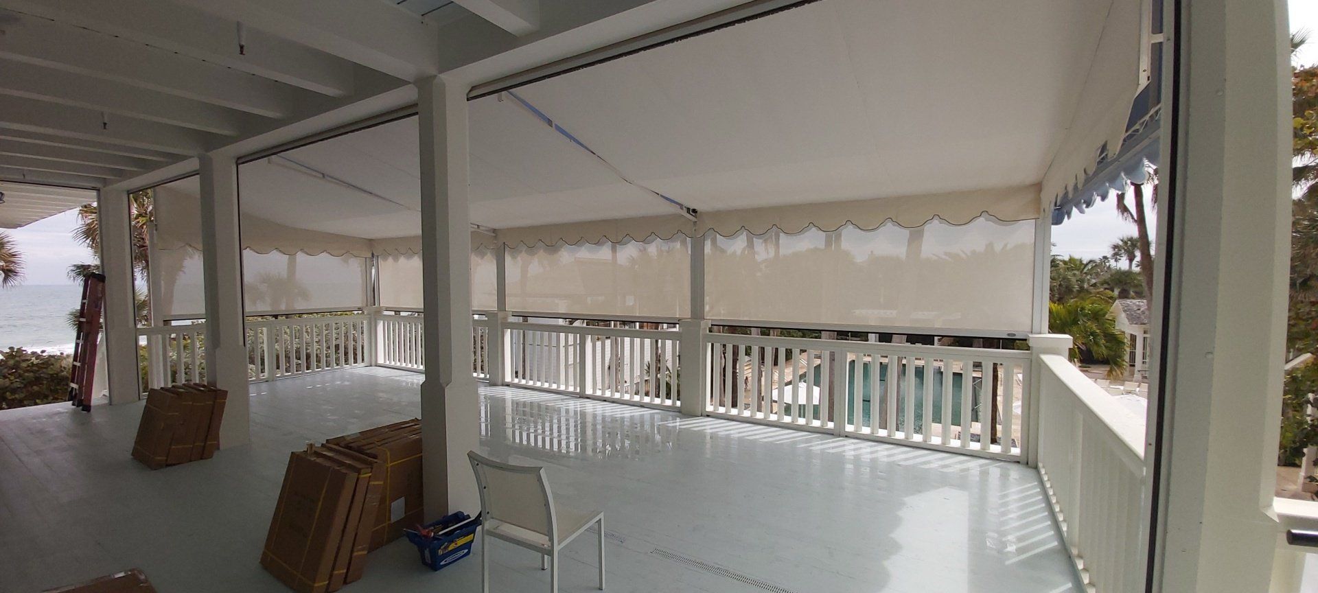 white awning and white chair