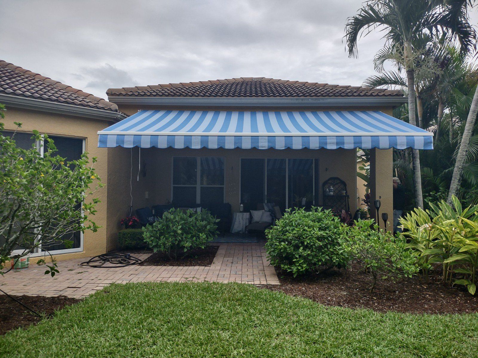 blue and white awning