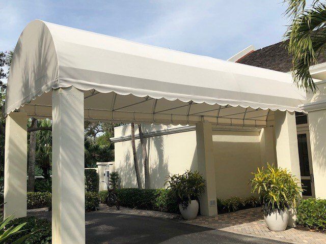 white tent awning at the entrance