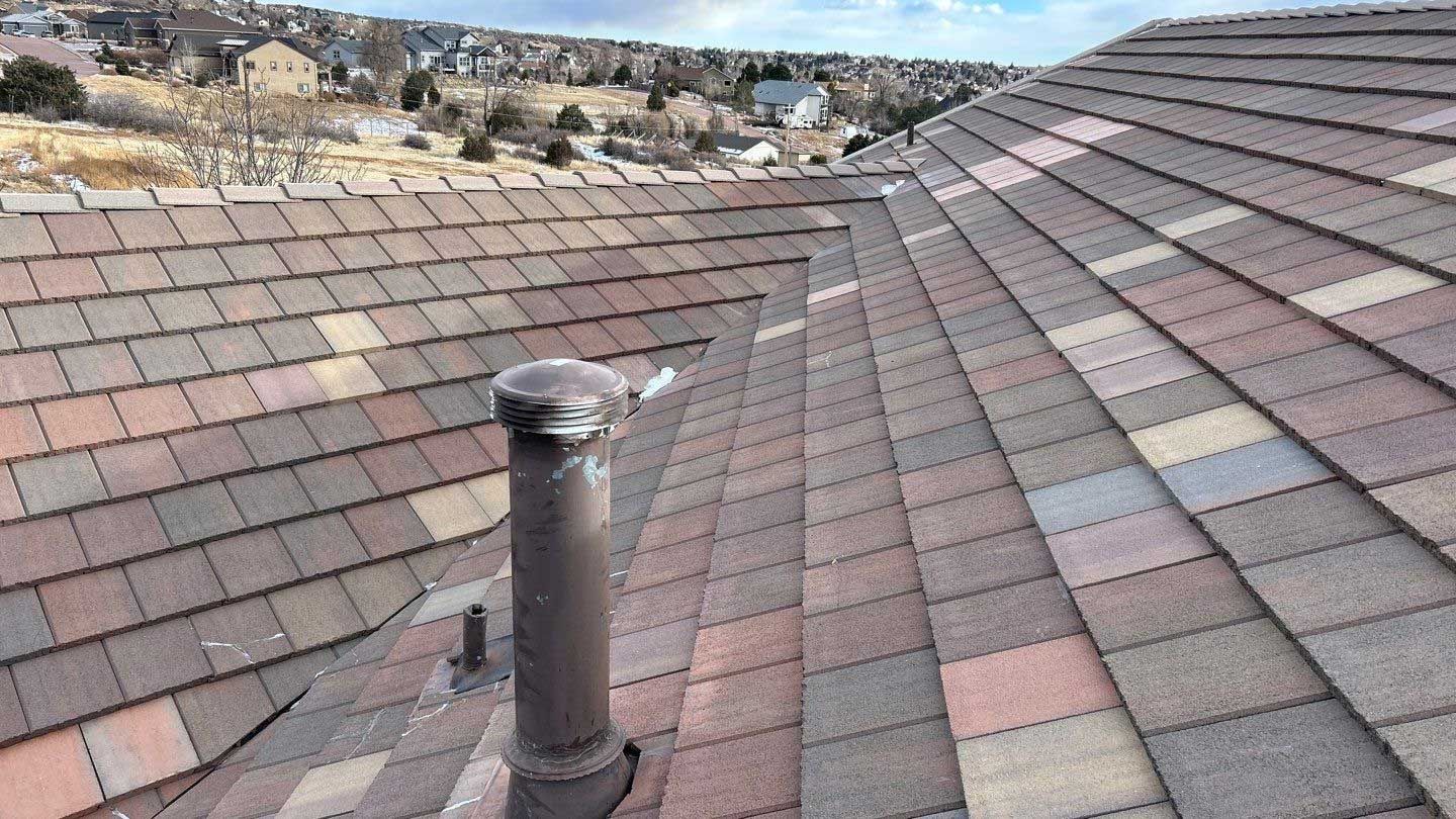 A roof with a chimney on top of it.