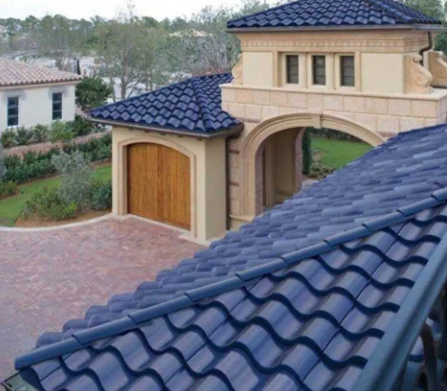 A large house with a blue tiled roof