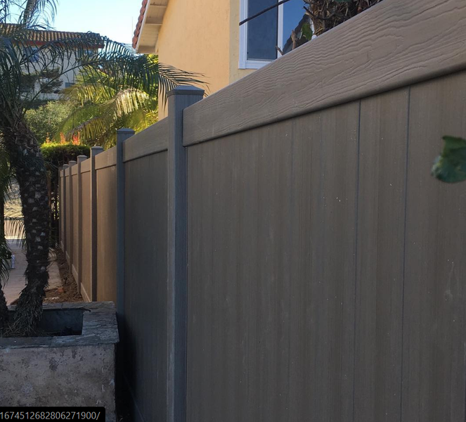 A picture of a wooden fence with the numbers 16745 on it