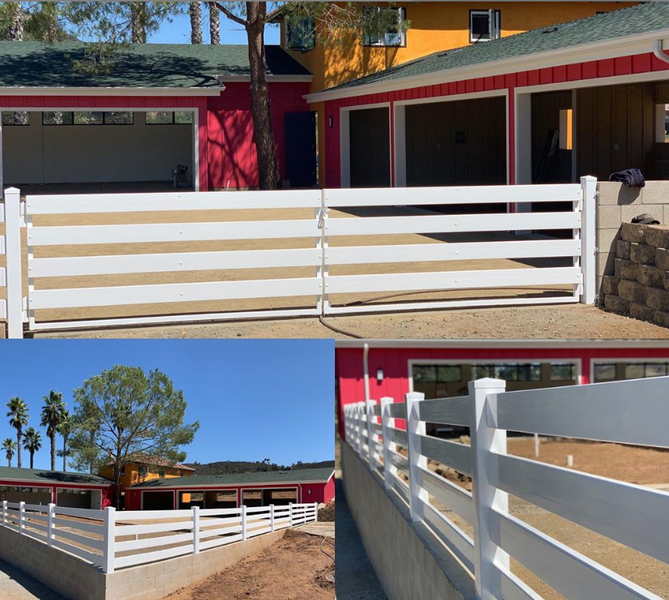 A red house with a white fence in front of it