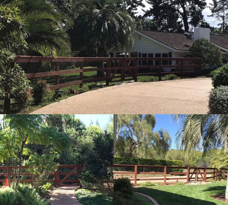 A house with a wooden fence surrounding it