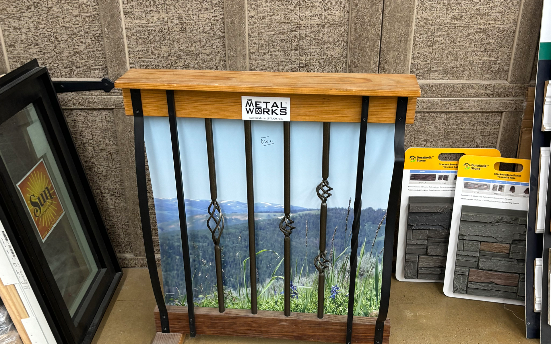 a display of a railing with a picture on it in a store 