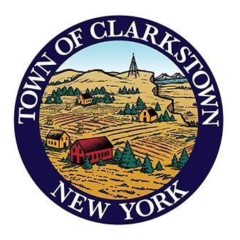 Town of Clarkstown, New York seal with a rural landscape and purple border