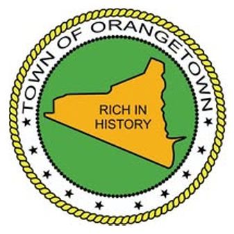 Town of Orangetown seal with green center, yellow New York outline, and “Rich in History” text