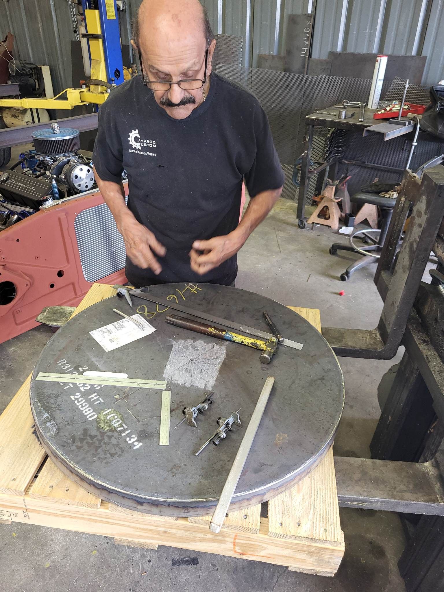 Man working on a metal part