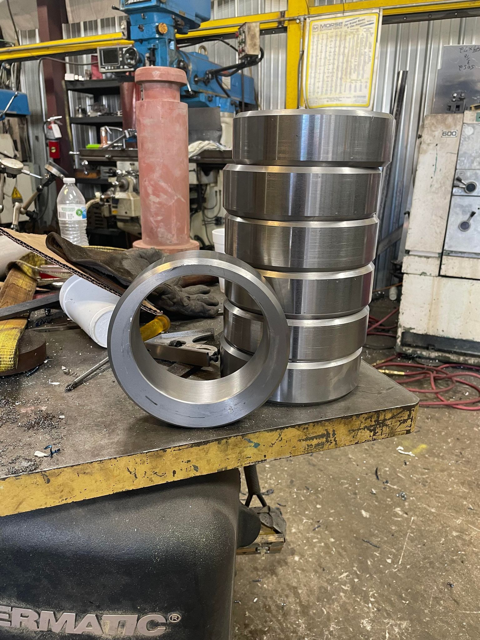 Seven round metal parts