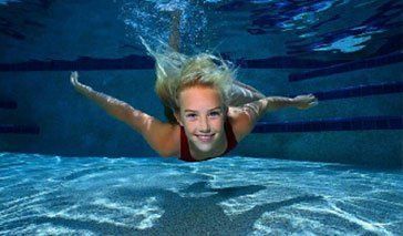 girl swimming on the pool