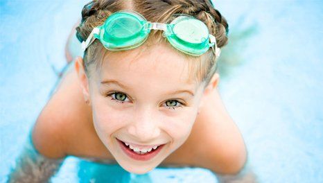 Little girl in swimming pool