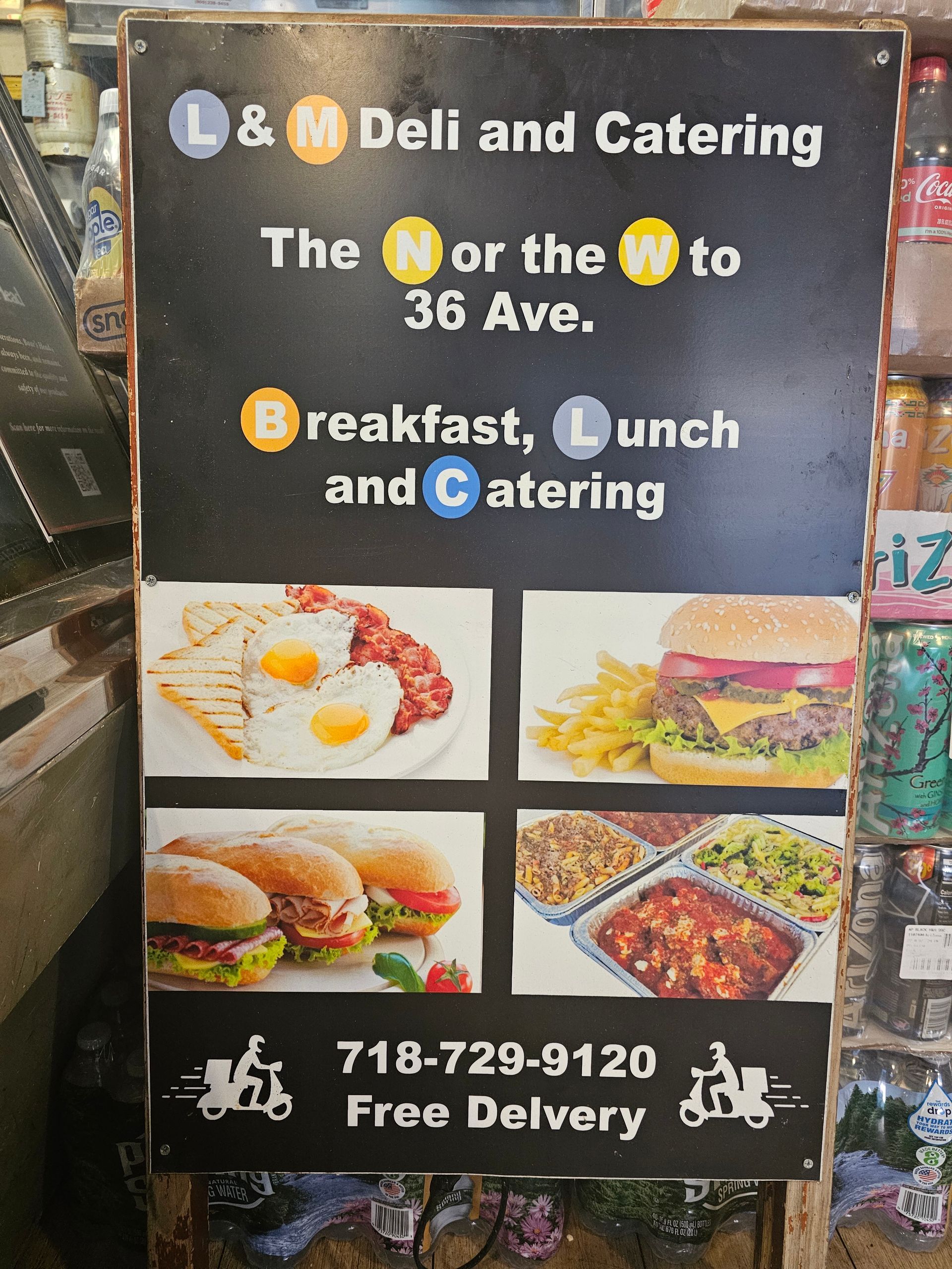 A sign that says l & m deli and catering on it.