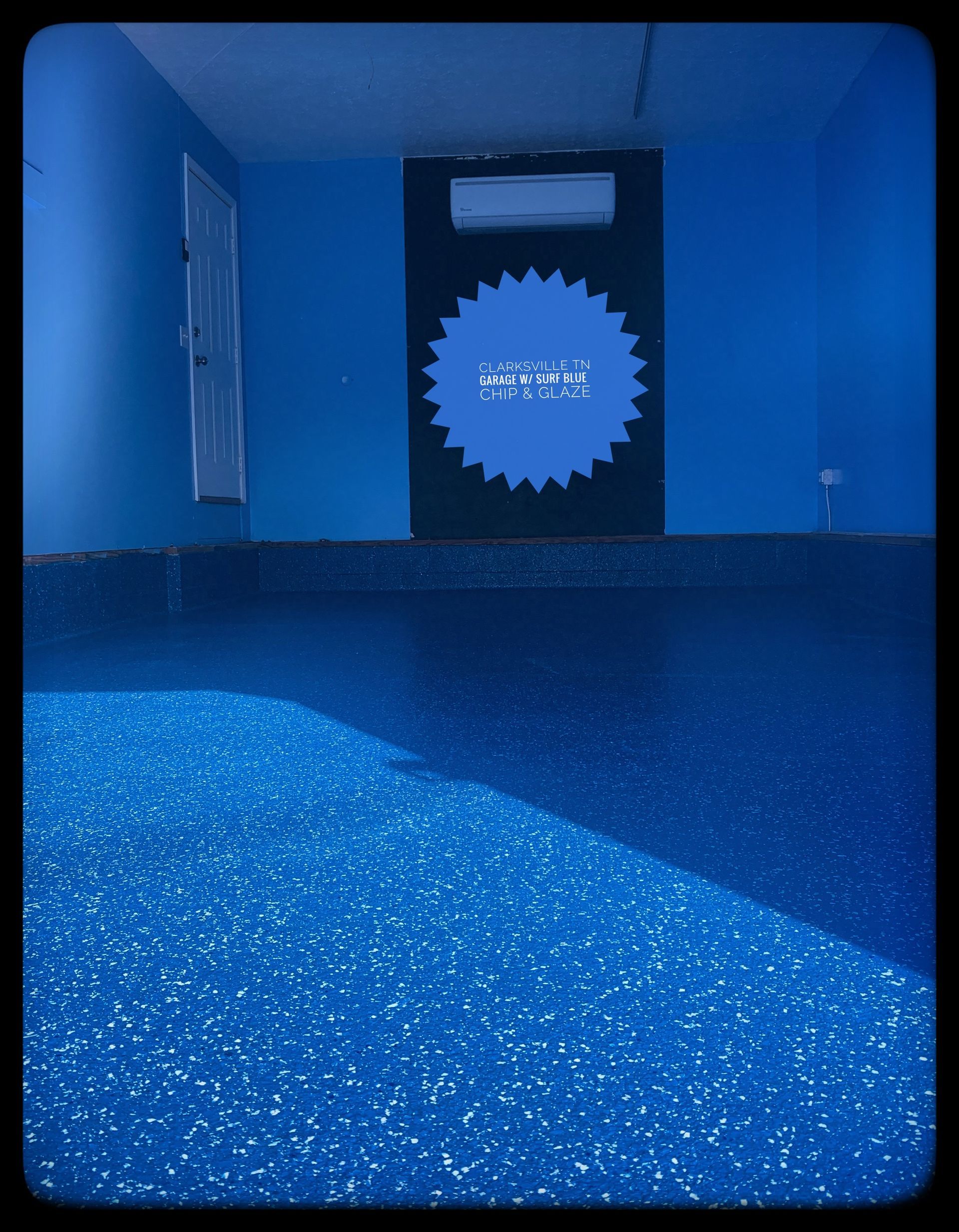 Blue hallway with glittery floor and a dark door featuring a bright starburst sign.