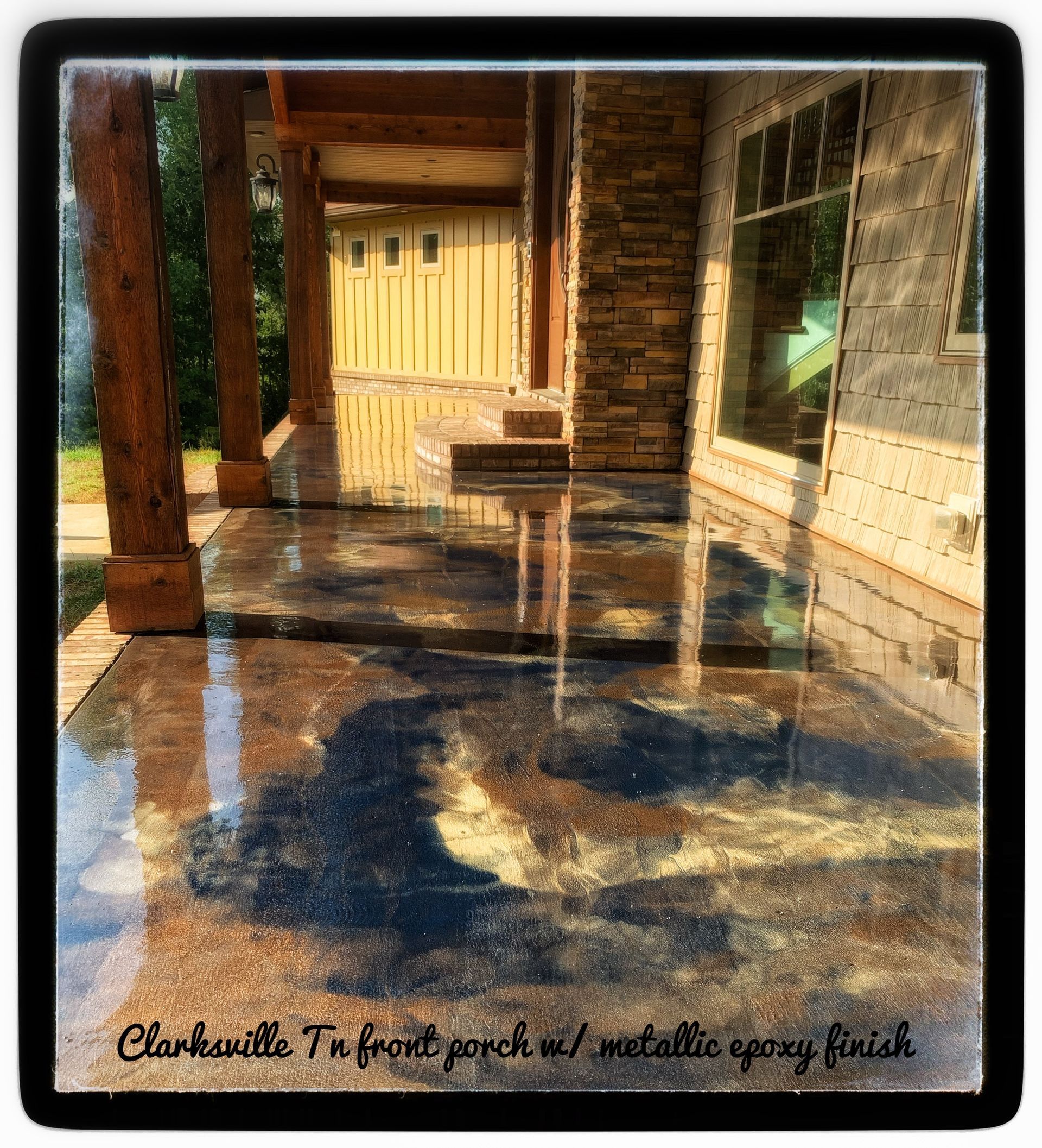 Sunny porch with wet floor, wooden posts, and a yellow gate reflected in the puddles
