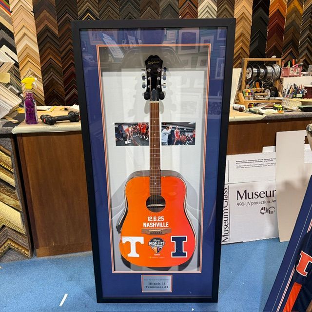 Pile of various colored frame corners, some with gold accents, on sale.