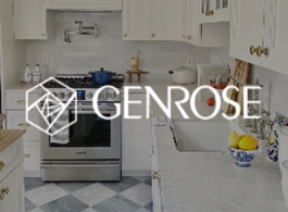 Bright white kitchen with gray cabinets, tiled floor, stove, sink, and floral fruit bowl on the counter.