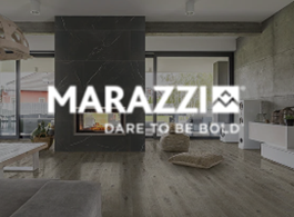 Modern living room with a dark fireplace wall, gray furniture, and the MARAZZI logo overlaid.