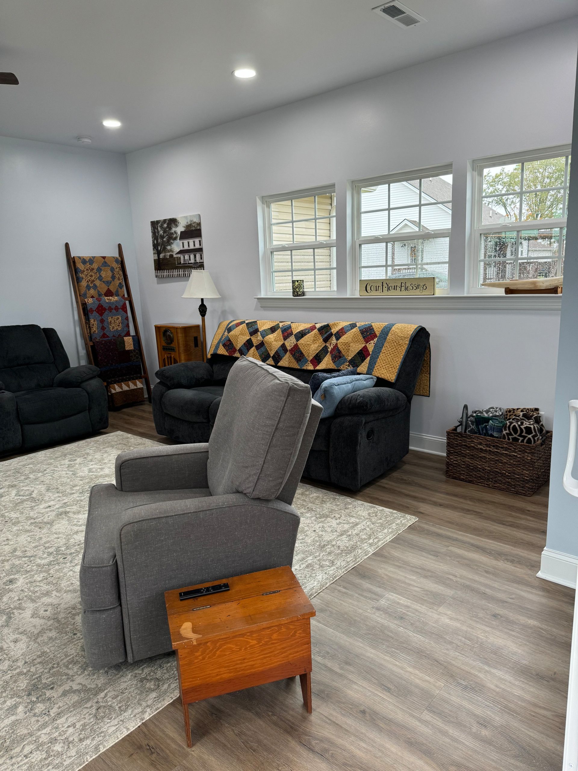 A living room filled with furniture and a couch.