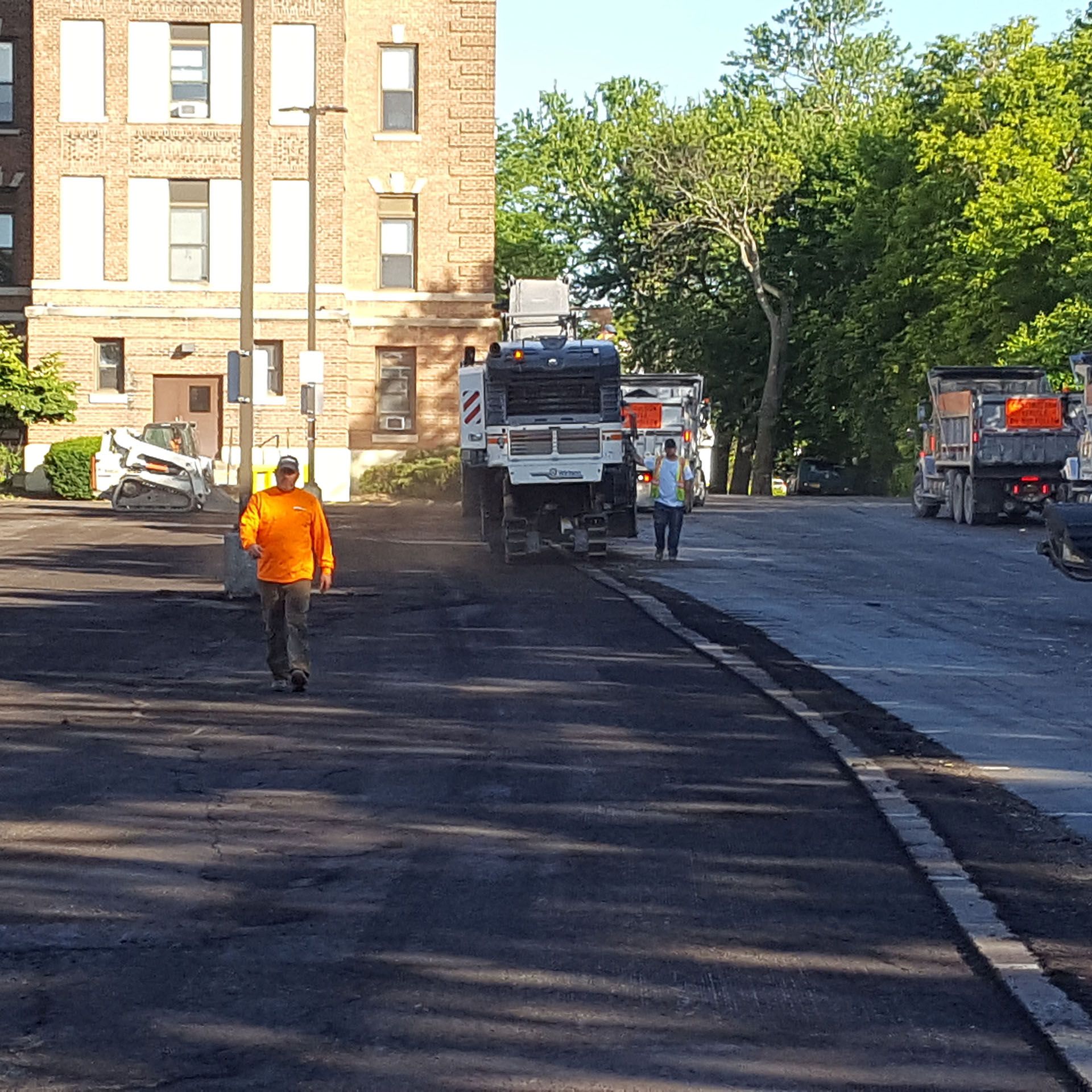 paving crew at work - lot repaving job