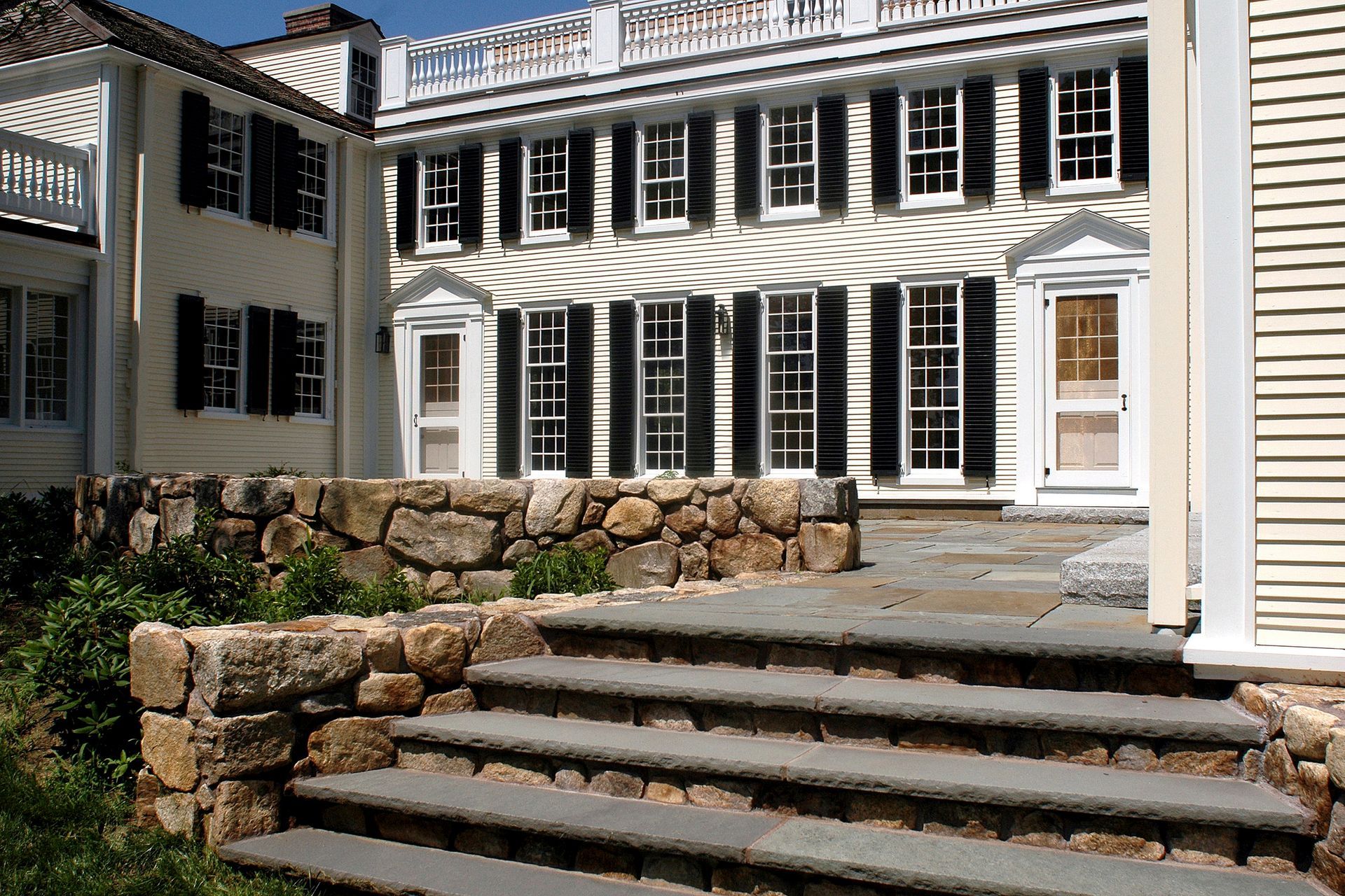 Steps leading up to a large white house