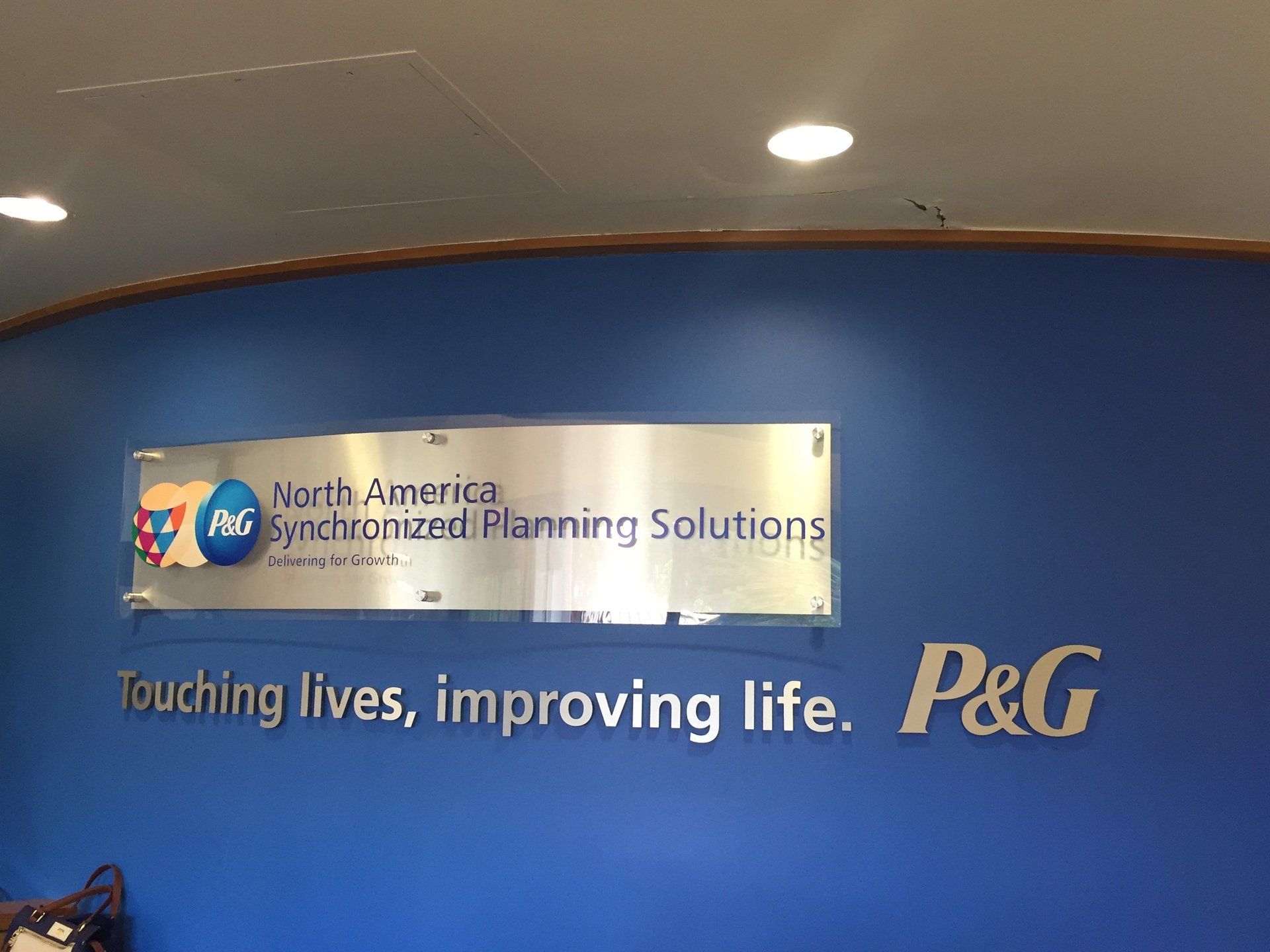 sign on acrylic with metal backup