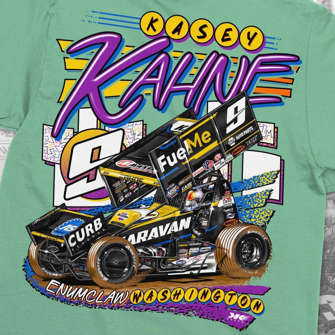 A green t-shirt with a picture of a race car on it