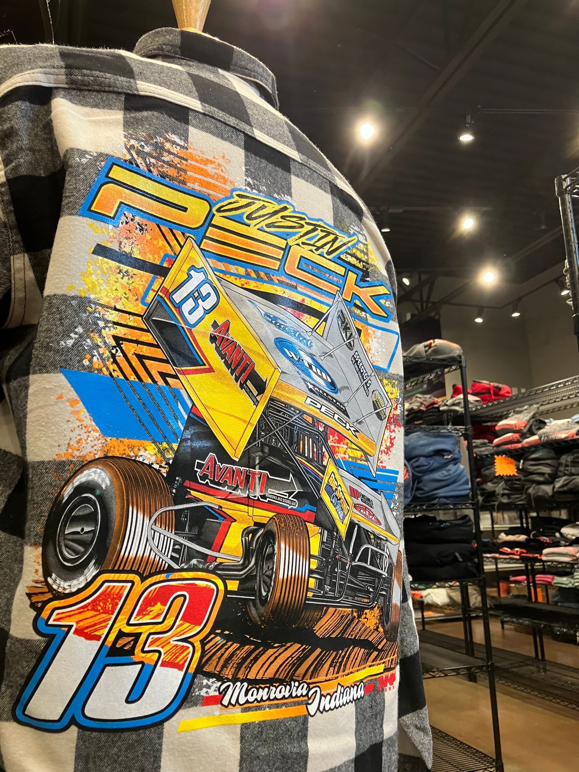 A woman wearing headphones and sunglasses on a yellow background.