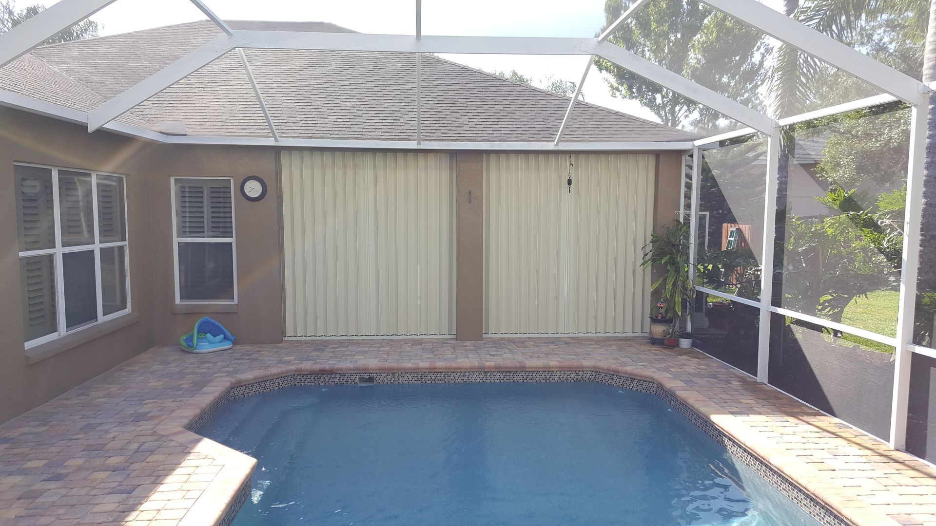 A large swimming pool in a backyard