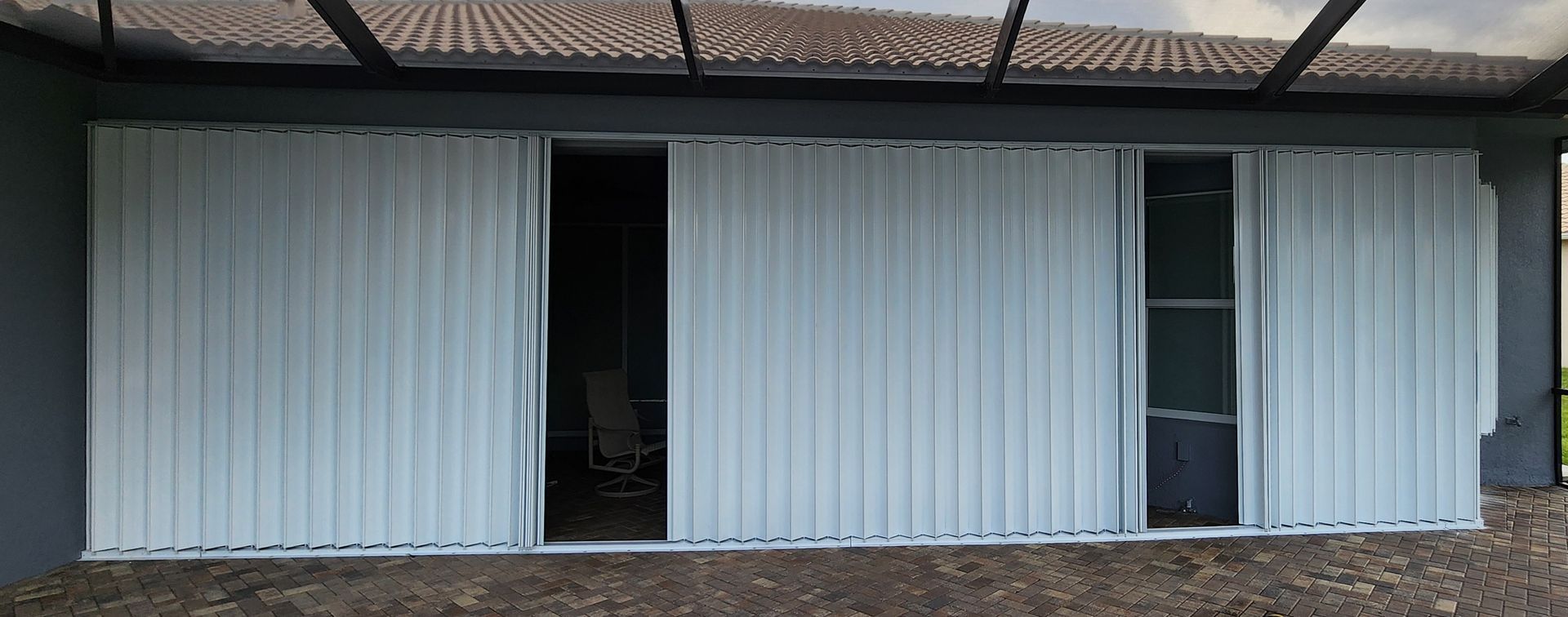 A white sliding garage door