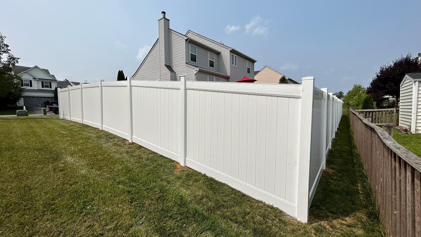White vinyl fence