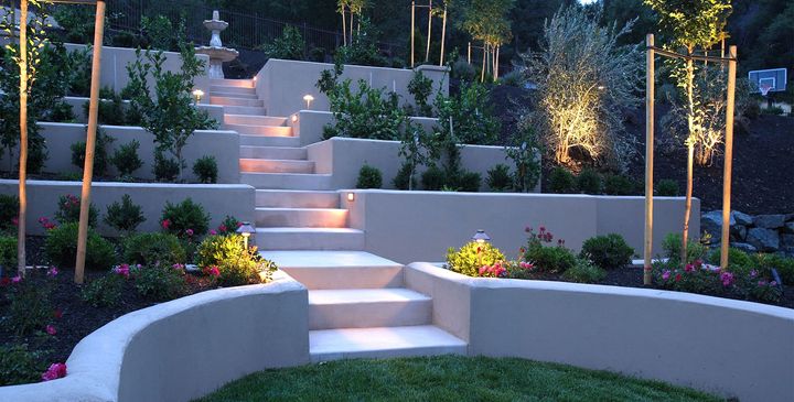 A set of stairs that are lit up at night