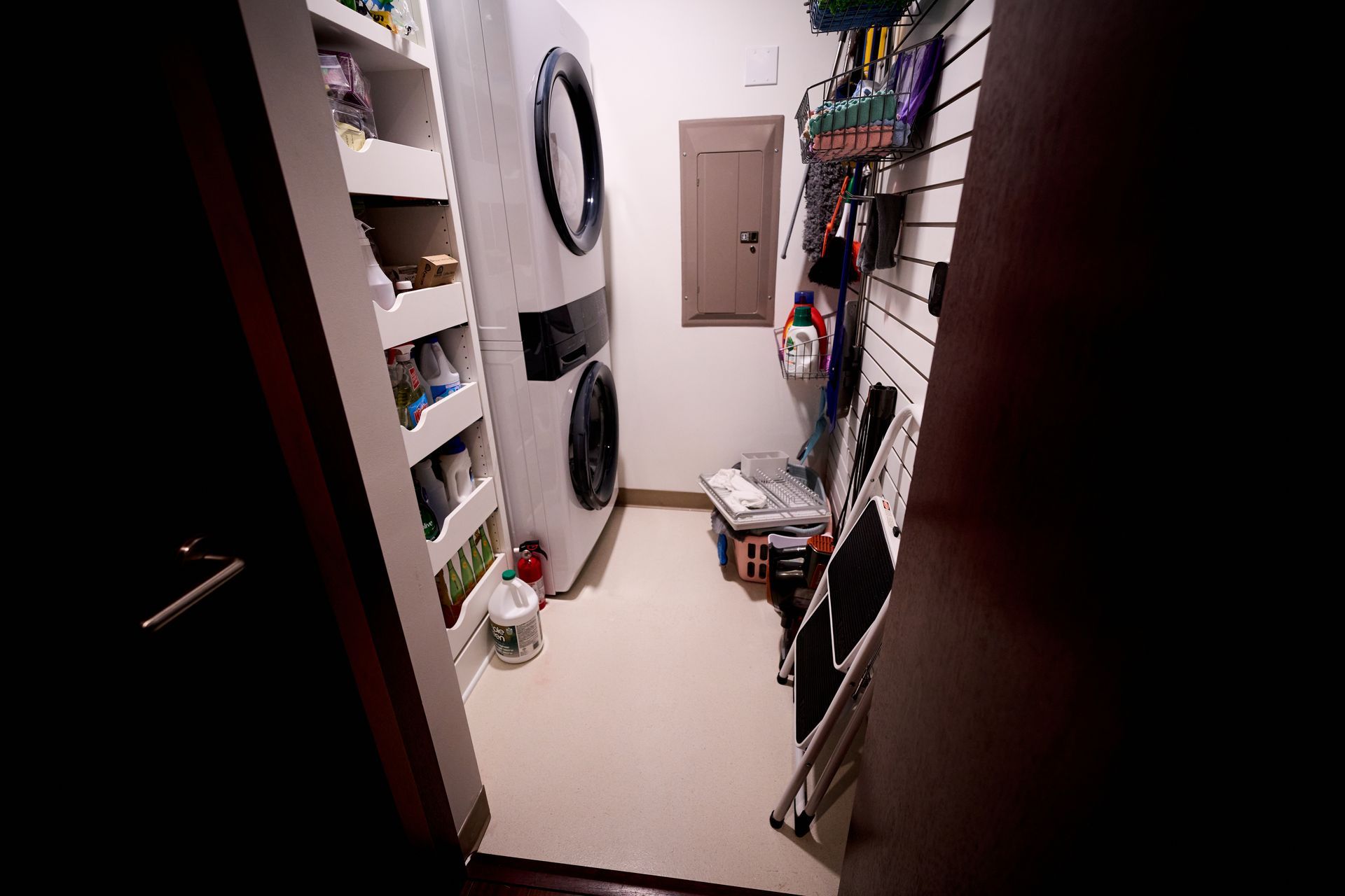 A laundry room with a washer and dryer in it.