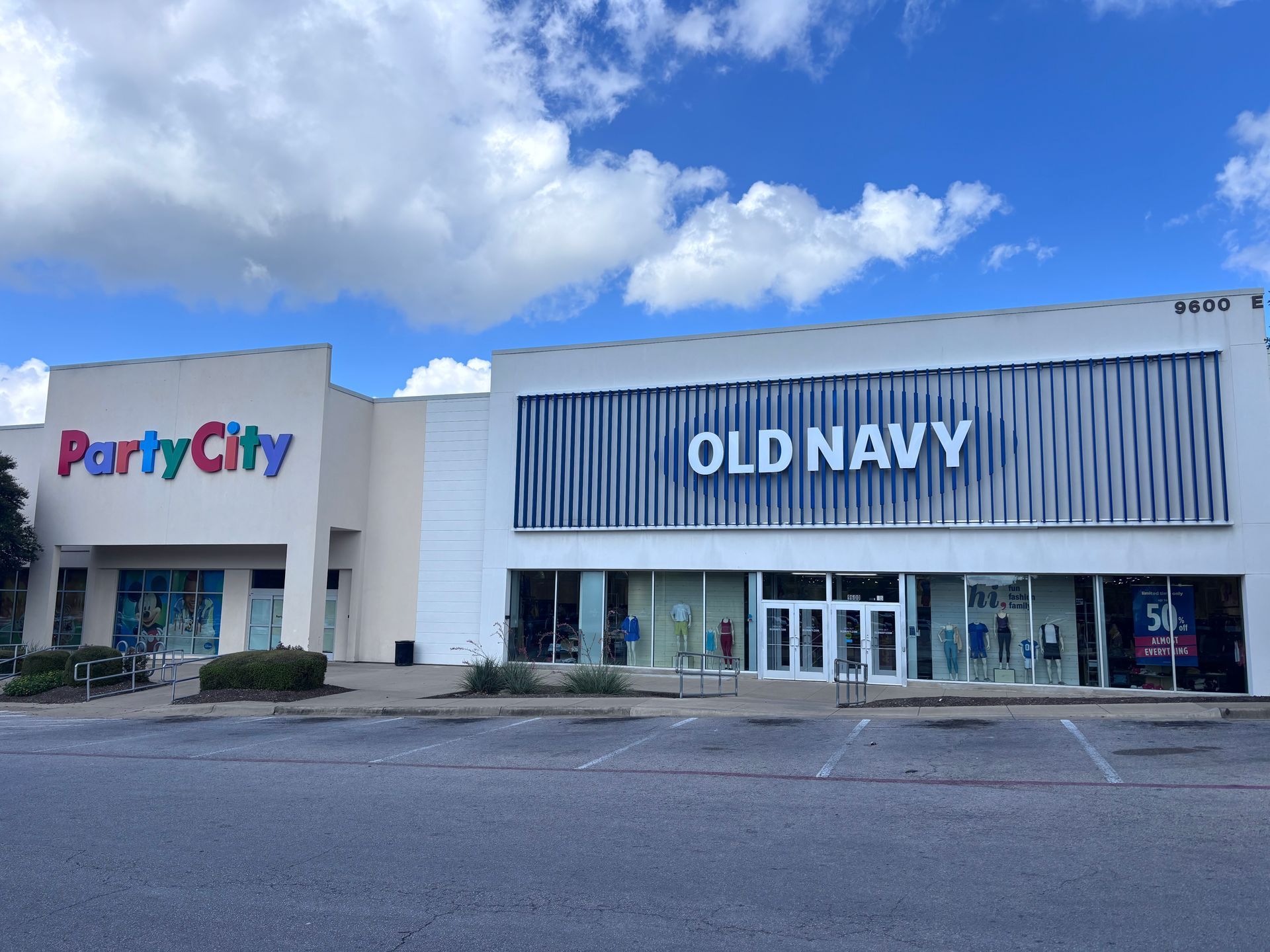 An old navy store is located next to a party city store.